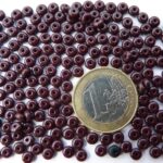0030104 Opaque oxblood rondelle 4 x 2 mm.-0