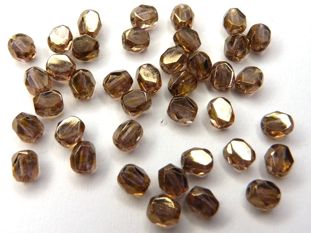 0030292 Crystal gold/lila luster 2 way facetted 4 mm. 40 Pc.-0