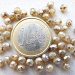 0040218 Opaalwit met zilver picasso, facet 4 mm. 40 Pc.-0