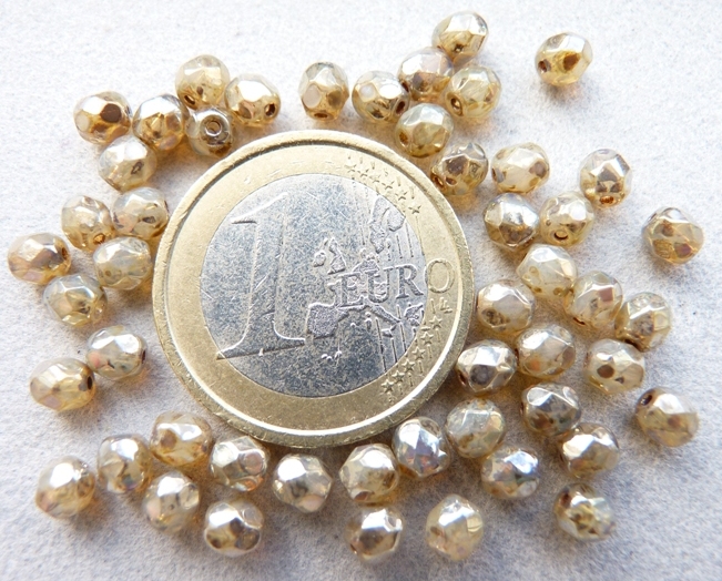 0040218 Opaalwit met zilver picasso, facet 4 mm. 40 Pc.-0 0040218 Opaalwit met zilver picasso, facet 4 mm. 40 Pc.-0