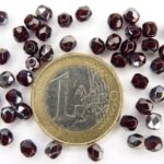 0050215 Garnet met half steel coating. facet 4 mm.-0