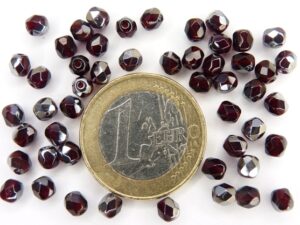 0050215 Garnet met half steel coating. facet 4 mm.-0