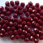 0050258 Dark Coral Red ( oxblood), facet 4 mm.-0