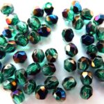 0100368 Emerald met Blue Iris facet 4 mm.-0