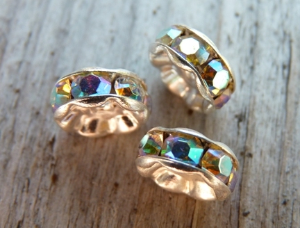 0160105 Strass rondellen silver Crystal AB 8,5 x 4 mm. 4 Pc.-927