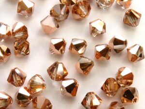 03-MC-00010-27101 Crystal Capri Gold bicones 3 mm