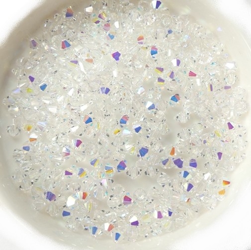 03-MC-00010-28701 Crystal AB. 50 stuks-0 03-MC-00010-28701 Crystal AB bicones 3 mm