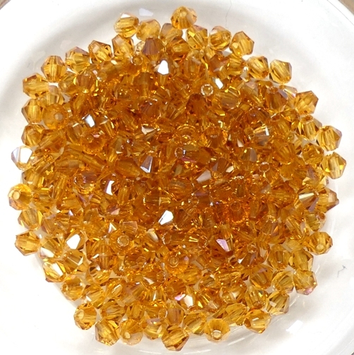 03-MC-10070-22501 Topaz Celsian Bicone 50 Pc.-15257