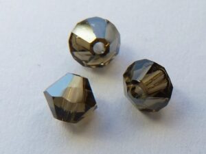 SW-04-SMKQSAT 5301 Smoky Quartz Satin Swarovski Bicone 4 mm. 40 St-0