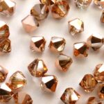 04-MC-00010-27101 Bicone, Crystal Capri Gold 4 mm. 50 Pc.-0