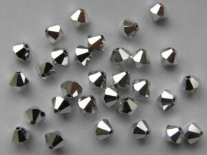 04-MC-00010-27000 Bicone, Silver ( Full labrador) 4 mm. 50 stuks-0