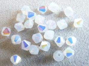 04-MC-01000-28701 Bicone, White Opal AB 4 mm. 50 Pc.-0