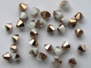 04-MC-03000-27101 Bicone, White Chalk Capri Gold 4 mm. 50 Pc.-0