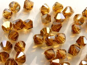 04-MC-10070-22501 Bicones Topaz Celsian 4 mm. 50 Pc.-0