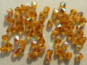 04-MC-10070-28701 Bicones Topaz AB. 4 mm. 50 Pc.-0