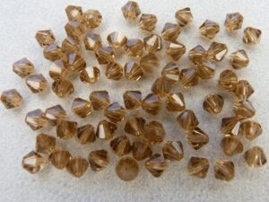 04-MC-10220 Bicones Smoke Topaz 4 mm. 50 Pc.-0