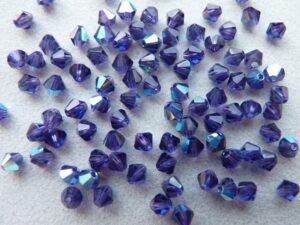 04-MC-20510-28701 Bicones Tanzanite AB 4 mm 50 Pc-0