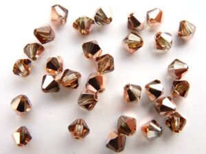 04-MC-10220-27101 Bicone, Smoked Topaz Capri Gold, 4 mm. 50 Pc.-0