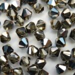 04-MC-40020-27637 Bicone, Black Diamond Blue Sky 4 mm. 50 Pc-0