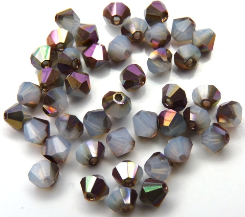 04-MC-01000-27101 Bicone, White Opal Capri Gold 4 mm. 50 Pc.-0 04-MC-01000-27101 Bicone, White Opal Capri Gold 4 mm. 50 Pc.-0