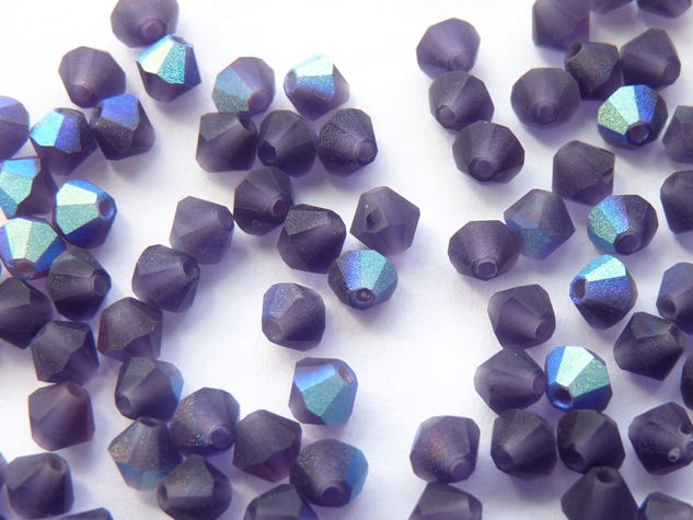 04-MC-20510-28771 Matte Tanzanite AB Bicones 50 Pc.-0 04-MC-20510-28771 Matte Tanzanite AB Bicones 50 Pc.-0