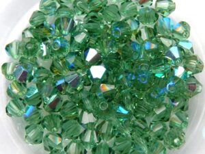 04-MC-50310-28701 Bicones, Turmaline AB 4 mm. 50 P:c.-0