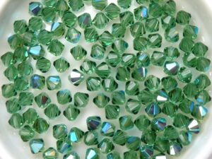 04-MC-50310-28701 Bicones, Turmaline AB 4 mm. 50 P:c.-11030