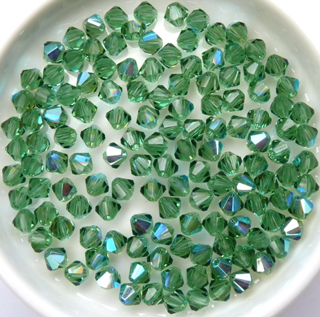 04-MC-50310-28701 Bicones, Turmaline AB 4 mm. 50 P:c.-11030