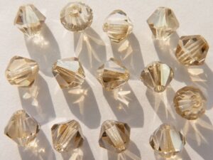 06-MC-00010-23501 Bicones Crystal Honey 24 Pc.-1675
