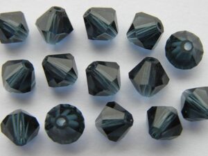 06-MC-30340 Bicones Montana Sapphire 6 mm. 24 Pc.-1151