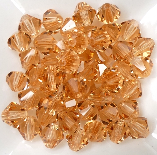 06-MC-70140 Bicone Light Peach 24 Pc.-15283