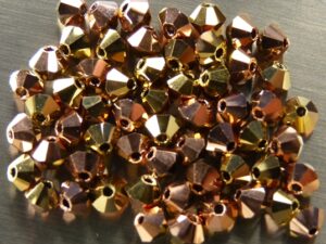 03-MC-00010-27101-26441 Bicones Crystal Capri Gold/Brass 3 mm. 50 Pc.-6845
