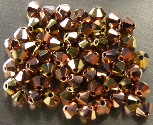 03-MC-00010-27101-26441 Bicones Crystal Capri Gold/Brass 3 mm. 50 Pc.-6845