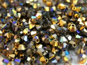 03-MC-00010-98536 Crystal Golden Rainbow bicones 3 mm