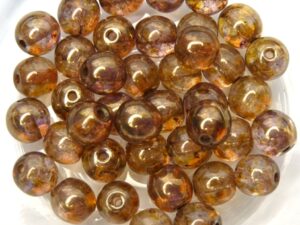 0030052 Crystal Lila Gold Luster round 6 mm. 40 Pc.-0