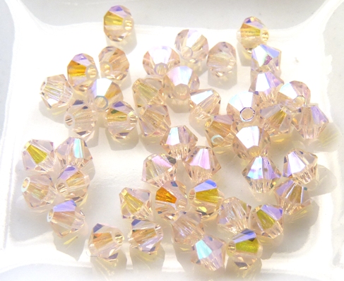 03-MC-70120-28701x2 Rosaline 2XAB Bicone, 3 mm. 50 Pc-8071