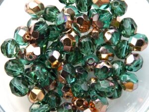 0100347 Teal Capri Gold facet 6 mm. 25 Pc.-0