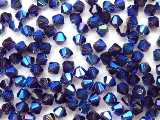 04-MC-20510-28701X2 Bicones Tanzanite 2XAB 4 mm. 50 Pc.-10224
