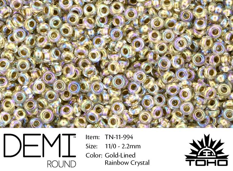 TN-11-0994 Demi Round TOHO Gold-Lined Raimbow Crystal-0