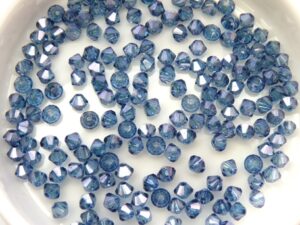 03-MC-00010-14464 Bicone, Crystal Blue Luster, 3 mm. 50 Pc.-10915