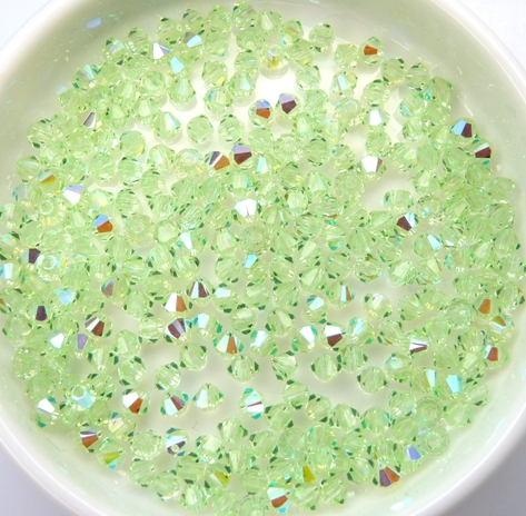 03-MC-50800-28701 Bicones Chrysolite AB 50 Stuks-10981