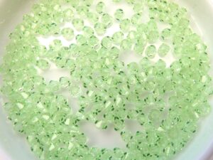 03-MC-50800 Bicones Chrysolite 50 Stuks-10976