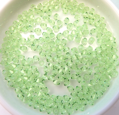 03-MC-50800 Bicones Chrysolite 50 Stuks-10976