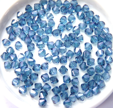 04-MC-00010-14464 Bicones Crystal Blue Luster 4 mm. 50 Pc.-10729