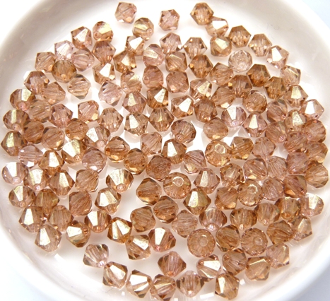 04-MC-00010-14495 Bicones Crystal Red Luster 4 mm. 50 Pc.-10738