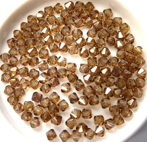 04-MC-00010-15695 Bicones Crystal Senegal Luster 4 mm. 50 Pc.-10751