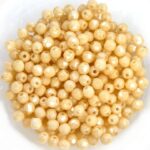 0040227 Opaque White Champagne Luster Facet 3 mm. 70 stuks-0