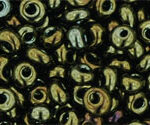 TM-03-0083 Metallic Iris Brown Magatama 3 mm. TOHO-0