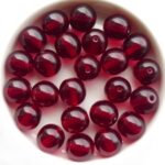 0050007 Garnet pressed round 10 mm. 15 Pc.-0