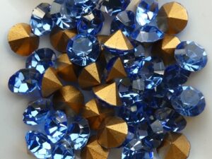 SS29-MCC-30020-98521 Light Sapphire Gold Foiled Chaton 6 mm. 12 Pc.-15350